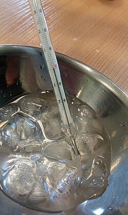 Measurement of an ice-water mixture in equilibrium at 370 m above sea level. Thermometer shows 0.05 ℃. The slight deviation from 0 ℃ is due to instrument uncertainty and trace water impurities.
