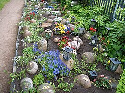 Cremation allows for very economical use of cemetery space. Mini-gravestones in Helsinki, Finland.