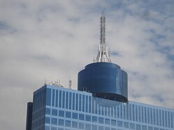 Antenna and spiral tower. The XHFO-FM antenna shown here is the one replaced in 2009, which brings the building's height to 218 meters.