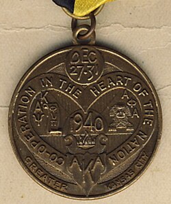 A closeup of an Alpha Phi Alpha delegate badge from the 23rd Boulé. The tri-convention—consisting of Alpha Kappa Alpha, Alpha Phi Alpha, and Kappa Alpha Psi—was held December 27–31, 1940, in Kansas City, Missouri.[13][23]