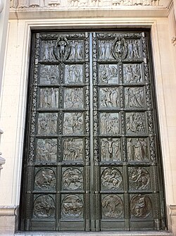 The right-hand bronze doors in the center portal