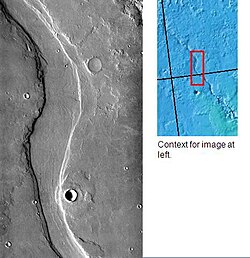 THEMIS image of Hrad Vallis. This valley may have formed when eruptions in the Elysium Mons volcanic complex melted ground or surface ice.