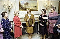 The National Woman's Party presents Ford with a plaque honoring her as its inaugural "Alice Paul Award" in the White House's Map Room on January 11, 1977 (the 92nd birthday of Alice Paul).[131]