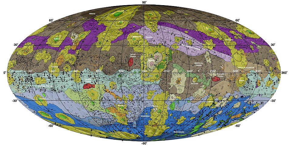 Geologic map of Vesta (Mollweide projection).[71] The most ancient and heavily cratered regions are brown; areas modified by the Veneneia and Rheasilvia impacts are purple (the Saturnalia Fossae Formation, in the north)[72] and light cyan (the Divalia Fossae Formation, equatorial),[71] respectively; the Rheasilvia impact basin interior (in the south) is dark blue, and neighboring areas of Rheasilvia ejecta (including an area within Veneneia) are light purple-blue;[73][74] areas modified by more recent impacts or mass wasting are yellow/orange or green, respectively.