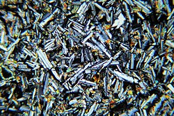 Photomicrograph of thin section of tholeiitic basalt (in cross polarized light)