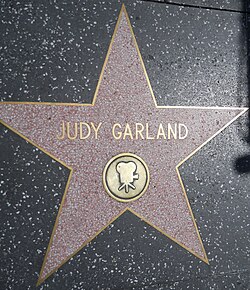 Star for recognition of film work at 1715 Vine Street on the Hollywood Walk of Fame; she has another for recording at 6764 Hollywood Boulevard.