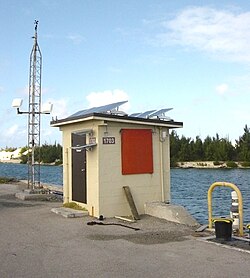 The NOAA weather station at Wake Island harbor measures and transmits data on wind speed, atmospheric pressure, air temperature and tides.