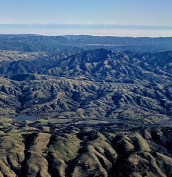Aerial view of Lick Observatory and Mount Hamilton, looking east after takeoff from Norman Y. Mineta San Jose International Airport