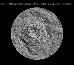 Shaded-relief topographic map of Vesta's southern hemisphere, showing Rheasilvia and Veneneia