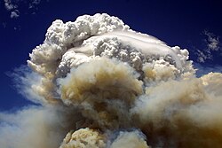 The 2004 Willow Fire burning near Payson, Arizona, producing a flammagenitus cloud.