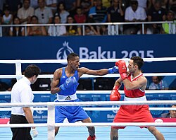 Boxer (right) using a punch catch