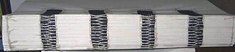 Hardbound book spine stitching