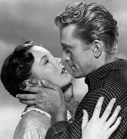 With Eve Miller in The Big Trees (1952)