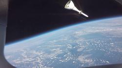 The launch abort system after it was jettisoned, as viewed by an automatic camera on Integrity